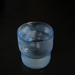 Japanese Chanel style long legged Hello Kitty doll bag charm  black leather Hello Kitty cat doll keychain and pendant.